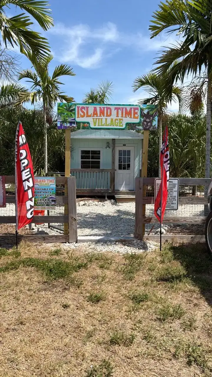The Island Time Village entrance gate and sign