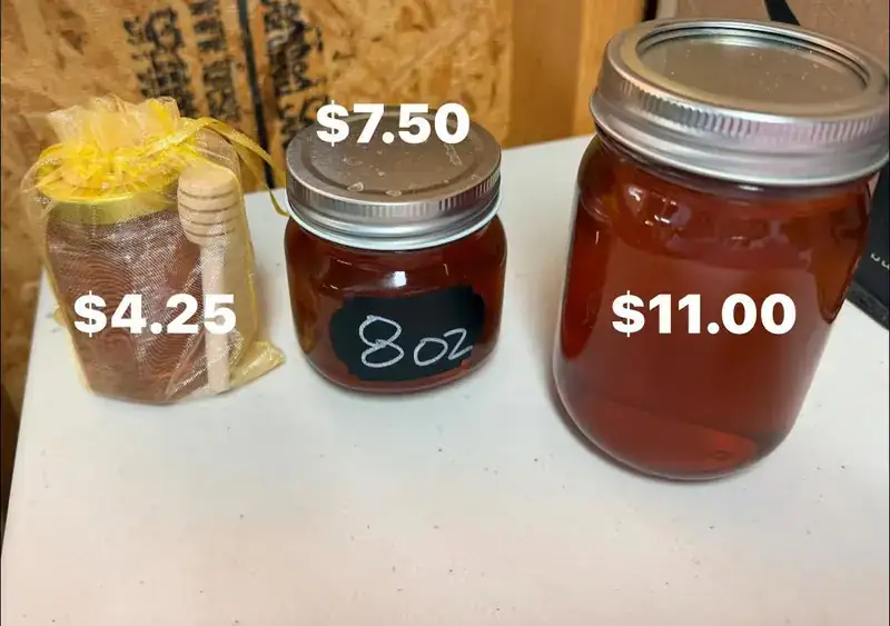 Three sizes of local honey jars
